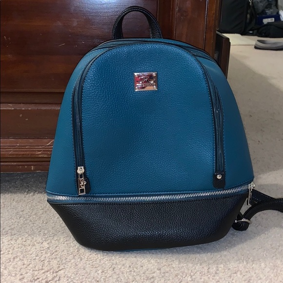 Handbags - Jessica Moore faux leather backpack